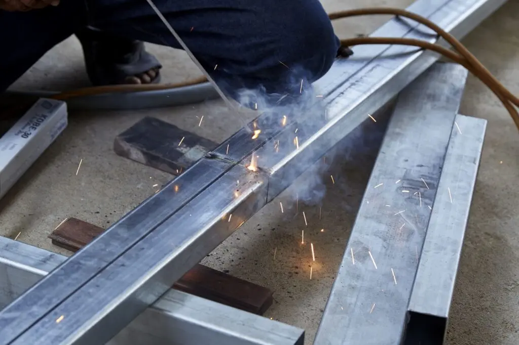 welders are welding steel factory